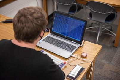 Student with computer